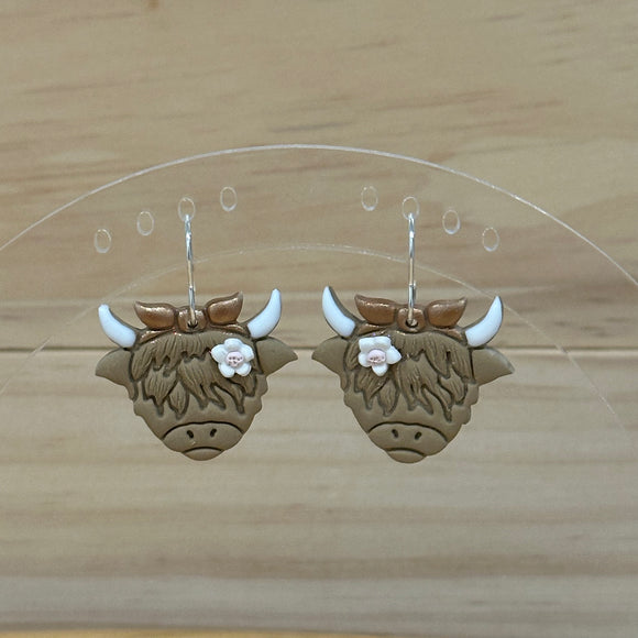 Highland Cow with flower