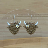 Highland Cow with flower