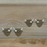 Highland Cow with flower